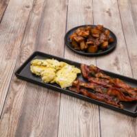 2 Eggs with Breakfast Meat · Choice of bacon, ham, sausage links, turkey patty or sausage patty. Served with home fries o...