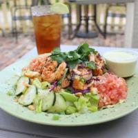 Shrimp Curry Salad · Cajun grilled shrimp over chopped romaine, shredded red and carrots, diced tomatoes, marinat...