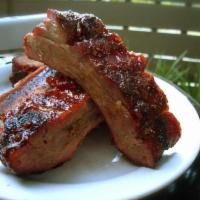 1/4 Rack Ribs with Leg and Thigh · Served with a side.