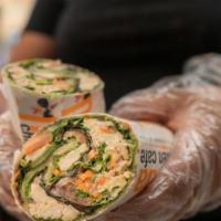 Chicken Mozzarella Wrap · Grilled chicken, lettuce, spinach, tomatoes, mozzarella cheese, basil, cucumber and balsamic...