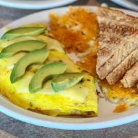Avocado Omelette Breakfast · 3 egg omelette stuffed with avocado, bacon and pepper jack cheese. Served with hash browns o...