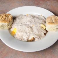 Country Breakfast Bowl · Hash brown topped with 3 scrambled eggs, sausage, cheddar cheese and country sausage gravy. ...