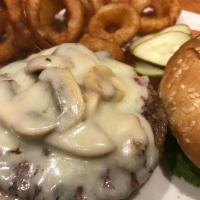 Mushroom Swiss Burger with Fries · Topped with sauteed mushrooms and Swiss cheese. Served with lettuce, tomato and pickle. 1/3 ...
