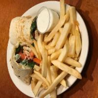 Chicken and Cheese Wrap · Grilled chicken breast, melted Jack cheese, shredded lettuce, tomato and ranch dressing. Ser...