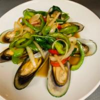 Butter Mussel · Mussels stir-fried in butter with fresh garlic, green onion and onions.