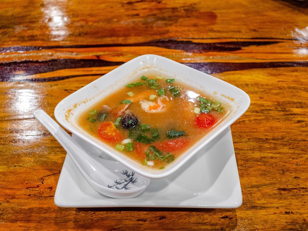 Tom Yum Hot and Sour Soup · Thai hot and sour soup choice of  your meat ( Vegetable, Chicken, Beef, Pork, Shrimp ($2.00 additional) with tomato, mushroom, green onion and cilantro.