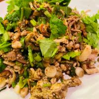 Chicken Larb Salad · Ground meat mixed with red onion, mint leaves, green onion, cilantro and rice powder.