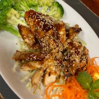 Chicken Teriyaki · Stir-Fried Chicken Teriyaki with broccoli, green onion and sesame seeds on top served with j...