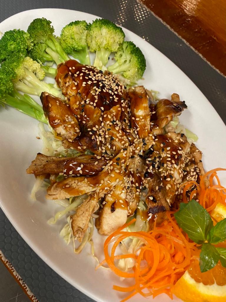 Chicken Teriyaki · Stir-Fried Chicken Teriyaki with broccoli, green onion and sesame seeds on top served with jasmine rice.