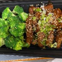 Beef Teriyaki · Stir-Fried Beef Teriyaki well done cooked with broccoli, green onion and sesame seeds on top...