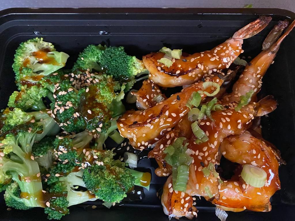 Shrimp Teriyaki · Stir-Fried Shrimp Teriyaki with broccoli, green onion and sesame seeds on top served with jasmine rice.