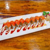 Super Crunch Roll · Japanese mayo, tempura flake mix and avocado topped with smoke salmon and eel sauce.