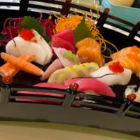 Sushi and Sashimi  Combo · Tuna roll, 7 piece sushi and 8 piece sashimi.