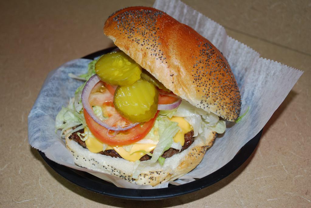 Cheeseburger · 8 oz. burger with American cheese, lettuce, tomato, onions, and pickles on a seeded roll.
