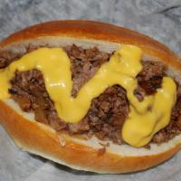 Philly Cheese Steak · Sliced Angus beef, cheddar cheese, and sauteed onions on a club roll.
