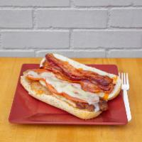 The Fantasia Sandwich · Breaded chicken cutlet on a wedge with Russian dressing, tomato, bacon and melted Swiss chee...