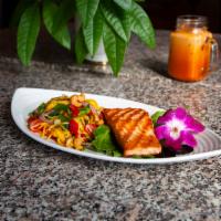88. Salmon Tango · 8 oz. Mongo, mixed salad served with sweet and sour sauce on top with cashew nut.