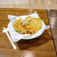 S1. Fried Basket · Shrimp, dumpling, sweet pumpkin, squid, rolled up fried laver, potato, spicy chili. A basket...