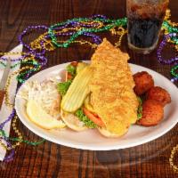 Catfish Po’boy · Can be served blackened or grilled. One delicious catfish fillet piled on a fresh baguette.
