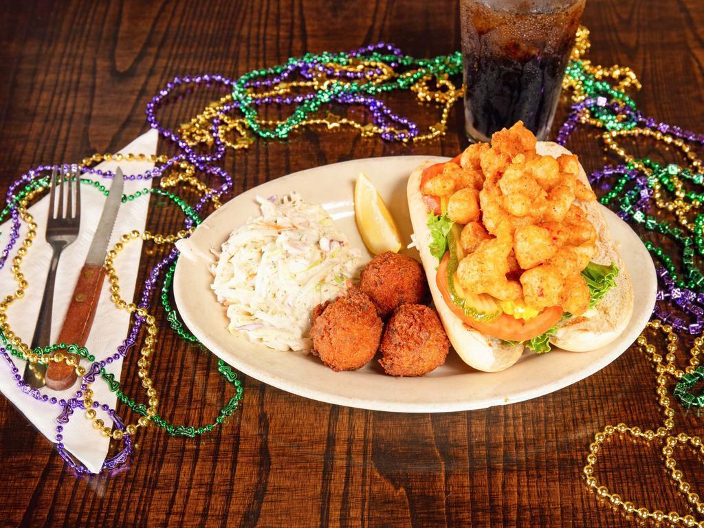 Crawfish Po’boy · Crawfish tails tossed in our signature Cajun seasoned batter, fried ’til golden and piled on a baguette.