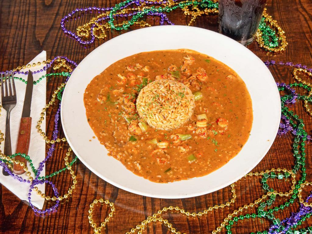 Crawfish Etouffée · Crawfish tail meat sauteed in our spicy dark roux and stock sauce. A Cajun staple with a nutty flavor. Spicy.