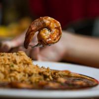 Shrimp Creole · Tender shrimp sautéed with tomato, peppers, onion, celery, and Cajun spices. 