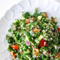 Tabouleh · Chopped parsley, bulgar (crushed wheat), tomatoes, onions, spices, olive oil and lemon juice...