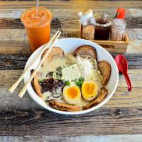 Shio Ramen · Chicken broth infused with salt base topped with chashu, seasoned egg, fish cake, corn, wood...