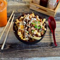 Pork Belly Fries · Deep-fried french fries with melted cheese, stir fry pork belly and yellow and green onion w...