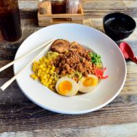 Tsukemen · Refreshing cold noodles topped with chashu, spiced ground pork, seasoned egg, corn, green on...