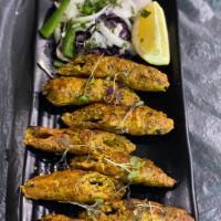 Murgh Kabab · Skewered juicy rolls of minced chicken blended with fresh cilantro, ginger, garlic, and spic...