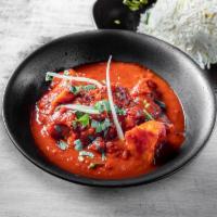 Murgh Vindaloo · Chicken in a tangy fiery sauce.