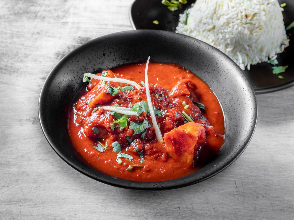 Murgh Vindaloo · Chicken in a tangy fiery sauce.