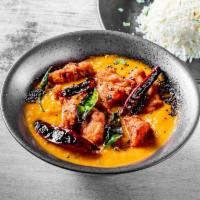 Fish Curry · Fish cooked in a tomato- onion gravy. 