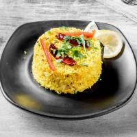 Lemon Rice · Lemon flavored rice with curry leaves and mustard sauce. 