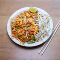 36.Pad Thai · Stir fried thin rice noodles with egg, green onion, bean sprouts, crushed peanuts and protein.