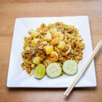 47.Pineapple Fried Rice · Pineapples, cashew nuts, tomatoes, egg and chicken.