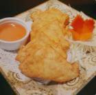 Crab Rangoon · 5 pieces. Crab mixed with cream cheese, fried, and served with plum sauce.