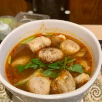Tom Yum  · Lemongrass soup with choice of meat.