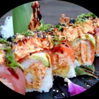 Wow Roll · Shrimp tempura and spicy crab salad roll topped with salmon, tuna, avocado and spicy crab sa...