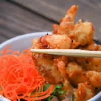 Popcorn Shrimp Bowl · Crispy, tempura battered shrimp, egg, shishito and assorted vegetables coated with creamy sp...