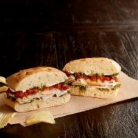 The Papa Joe Sandwich · Dedicated to our founder's dad. Roasted turkey breast, Asiago, roasted tomatoes, pesto aioli...