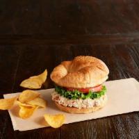Shelley’s Deli Chicken Sandwich · Our famous chicken salad with almonds and pineapple, leafy lettuce, tomato, toasted croissan...