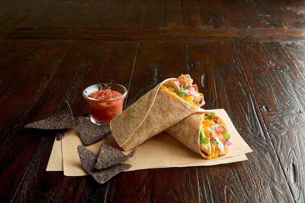 Ranchero Wrap · Grilled, 100% antibiotic-free chicken breast, cheddar, jalapenos, pico de gallo, southwest spices, ranch dressing, toasted organic wheat wrap and blue corn chips with salsa.