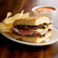 1/4 Muffaletta Special · Served with chips or baked chips and 1 side: cup of soup, fruit or new option mac and cheese.