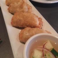 Chicken Curry Puff ·  Minced chicken and potato. Served with aja sauce.