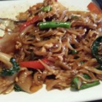 Spicy Holic Noodles · Thin rice noodle, string bean, long hot chili, onion, basil and chili basil sauce.