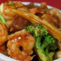 42. Shrimp with Mixed Vegetables · Jumbo shrimp sauteed with mixed vegetables in brown sauce. With a side of rice.