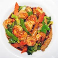 44. Szechuan Shrimp · Jumbo shrimp with mushrooms, broccoli, scallion, snow peas, zucchini, and carrots in a spicy...