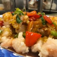 Curry Shrimp · Jumbo shrimps sautéed with (red and green) bell peppers and onions in curry sauce. With a si...